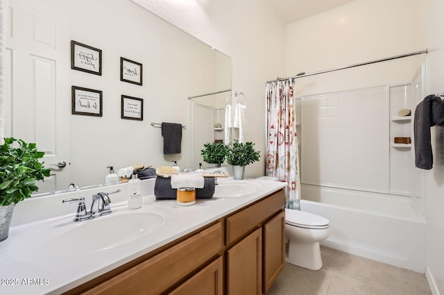 full bathroom with vanity, shower / tub combo with curtain, tile patterned floors, and toilet