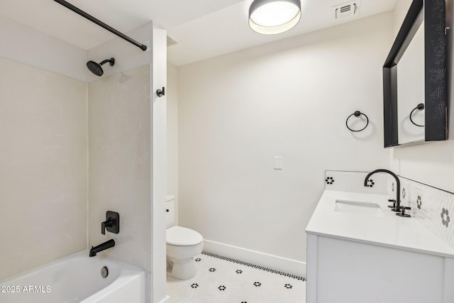 bathroom with visible vents, toilet, washtub / shower combination, vanity, and baseboards