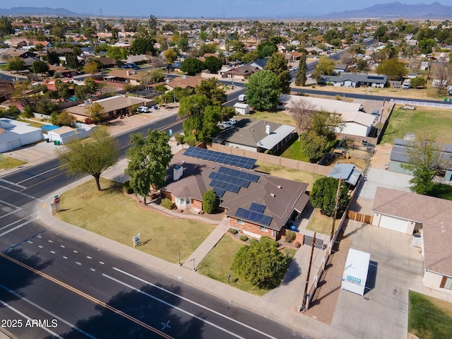 drone / aerial view with a residential view and a mountain view