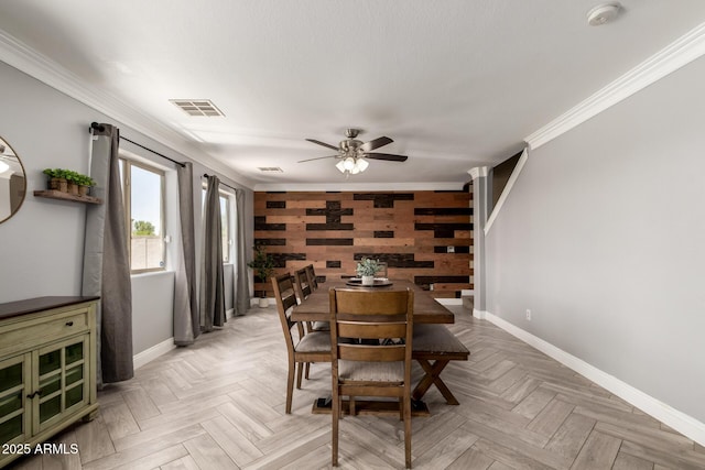 23332 N Serenity Trl, Florence, AZ 85132 - dining room featuring crown molding, a ceiling fan, and wood walls