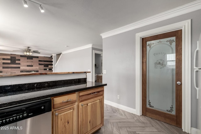 23332 N Serenity Trl, Florence, AZ 85132 - kitchen with stainless steel dishwasher, ornamental molding, ceiling fan, and dark stone counters