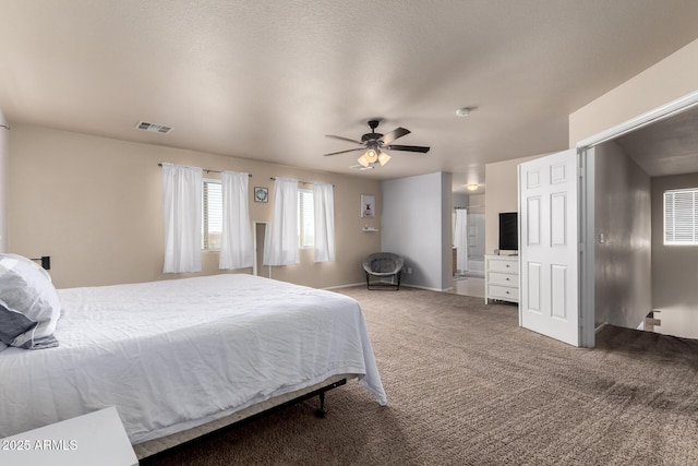 23332 N Serenity Trl, Florence, AZ 85132 - bedroom with light colored carpet and ceiling fan