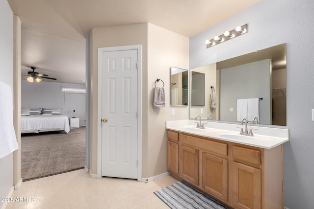 23332 N Serenity Trl, Florence, AZ 85132 - bathroom with double vanity, a ceiling fan, ensuite bathroom, and a closet