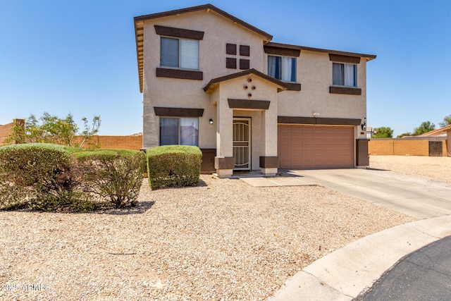 23332 N Serenity Trl, Florence, AZ 85132 - view of front facade with stucco siding, driveway, and a garage