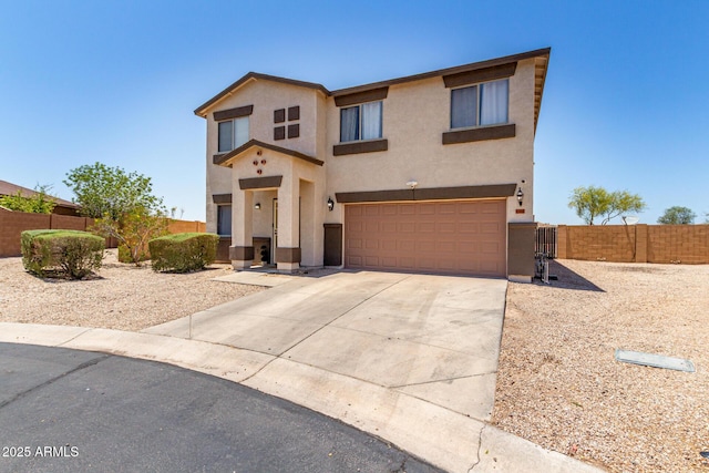 23332 N Serenity Trl, Florence, AZ 85132 - view of front of home with a garage, stucco siding, and driveway