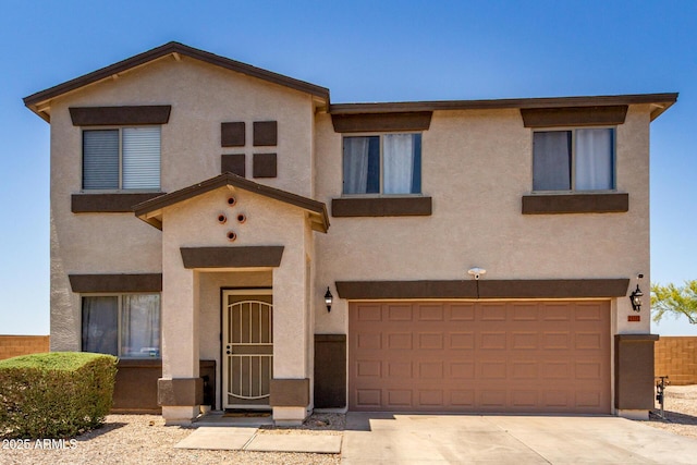 23332 N Serenity Trl, Florence, AZ 85132 - view of front of home with stucco siding, concrete driveway, and a garage