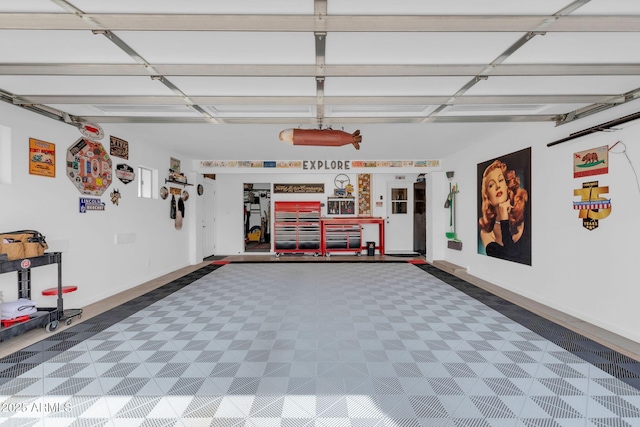 garage featuring baseboards