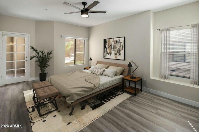 bedroom featuring ceiling fan and light hardwood / wood-style floors