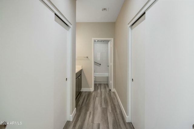 hallway featuring light wood-type flooring