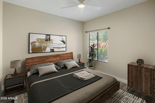 bedroom with ceiling fan and wood-type flooring