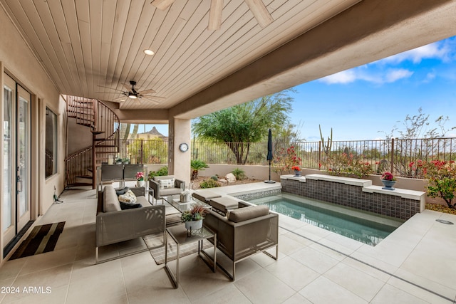 view of patio / terrace featuring a swimming pool, ceiling fan, and an outdoor hangout area