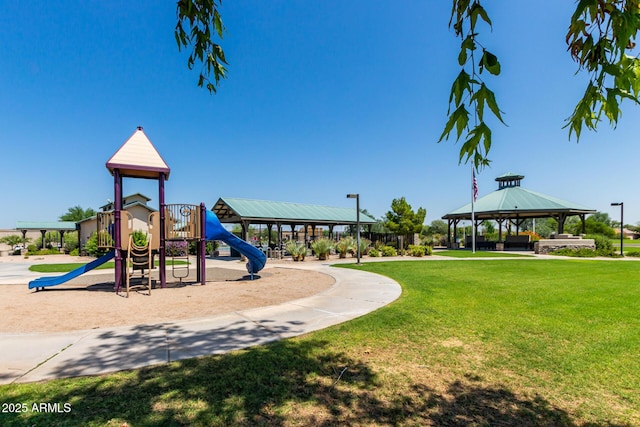 community play area with a gazebo and a lawn