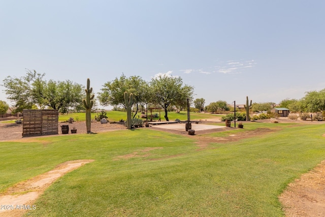 view of home's community featuring a yard