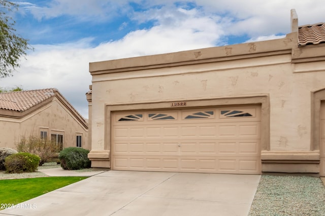 exterior space featuring a garage