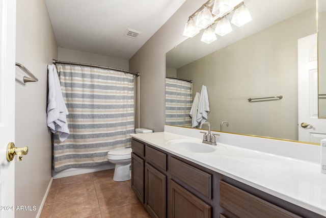 bathroom featuring tile patterned floors, vanity, toilet, and a shower with curtain