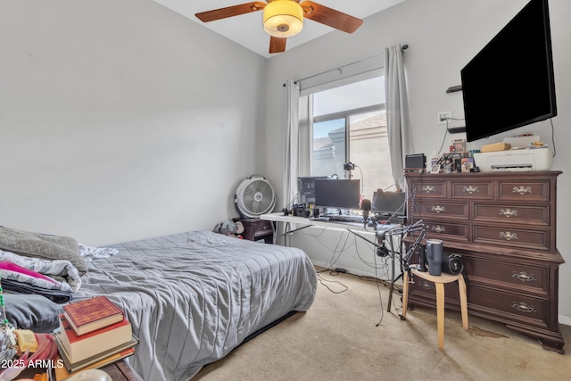 bedroom featuring lofted ceiling, light colored carpet, and ceiling fan