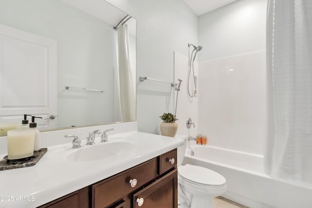 full bathroom featuring toilet, vanity, and shower / bath combination with curtain