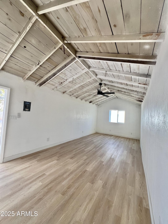 interior space with lofted ceiling with beams, ceiling fan, wooden ceiling, and light hardwood / wood-style floors