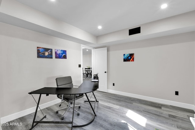 office space with recessed lighting, baseboards, and wood finished floors