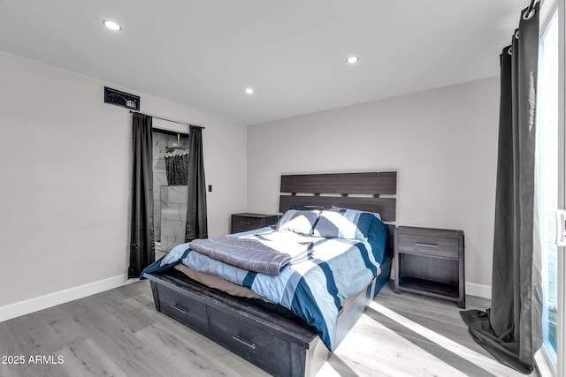 bedroom featuring light wood-style flooring, recessed lighting, and baseboards