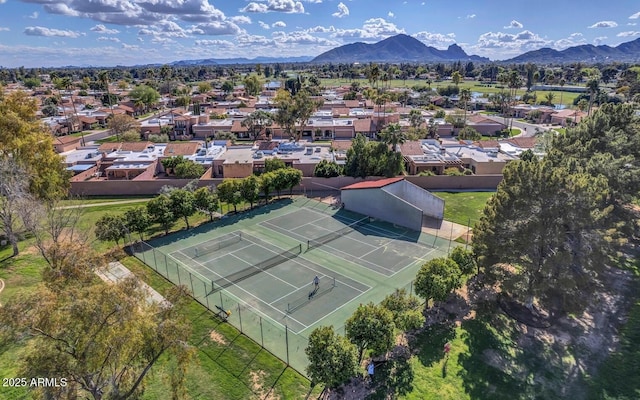 drone / aerial view with a residential view and a mountain view