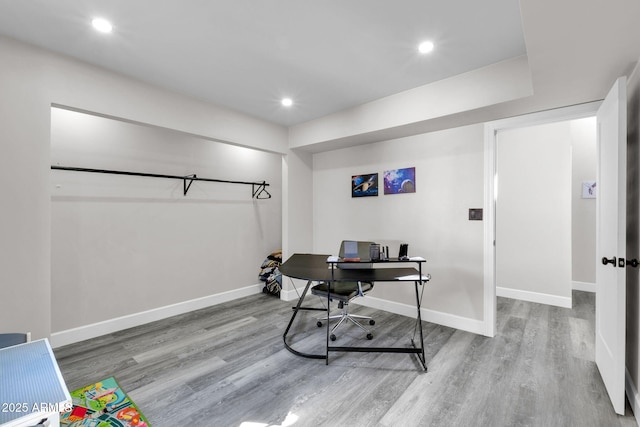 office area featuring recessed lighting, wood finished floors, and baseboards