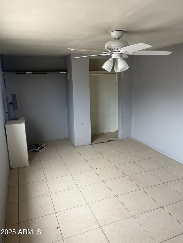527 S Macdonald, Mesa, AZ 85210 - spare room with a ceiling fan and light tile patterned floors