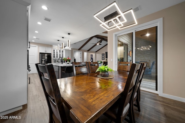 1500 W Pinetree Ct, Show Low, AZ 85901 - dining area featuring wood finished floors, lofted ceiling, a ceiling fan, and recessed lighting
