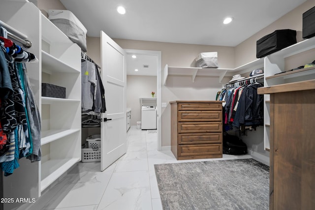 1500 W Pinetree Ct, Show Low, AZ 85901 - spacious closet featuring light marble finish floors and washer / clothes dryer
