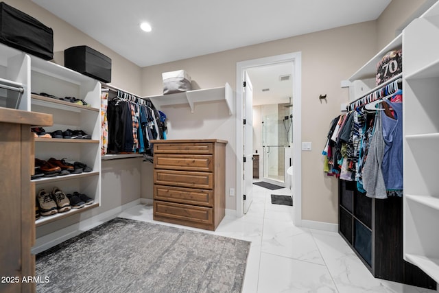 1500 W Pinetree Ct, Show Low, AZ 85901 - walk in closet featuring marble look tiles