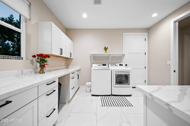 1500 W Pinetree Ct, Show Low, AZ 85901 - laundry area featuring independent washer and dryer, cabinet space, light marble finish flooring, and recessed lighting