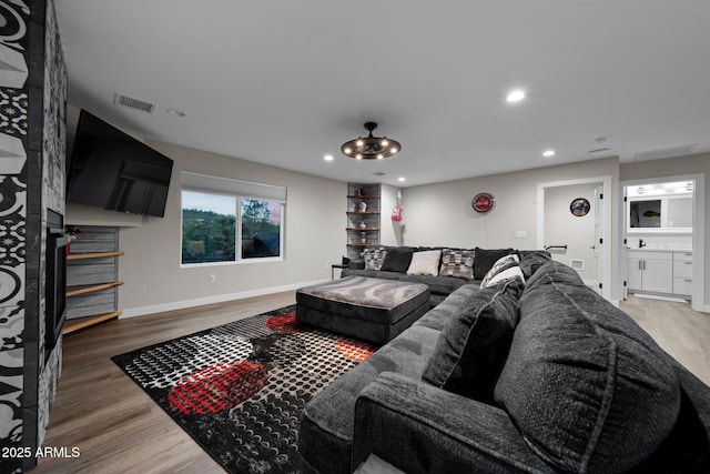 1500 W Pinetree Ct, Show Low, AZ 85901 - living area with light wood-type flooring and recessed lighting