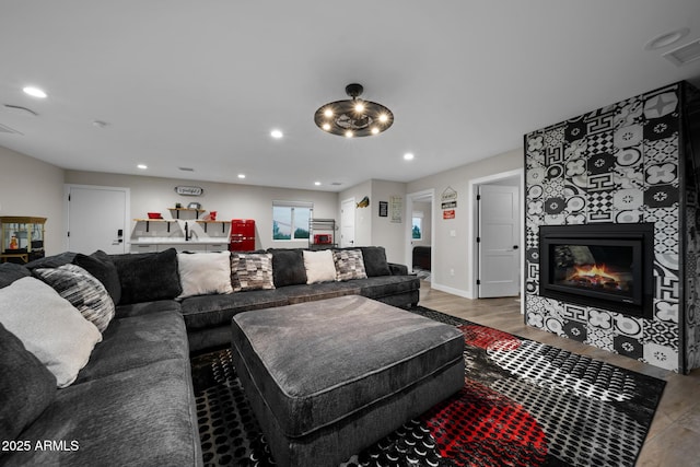 1500 W Pinetree Ct, Show Low, AZ 85901 - living room featuring a fireplace, recessed lighting, and wood finished floors