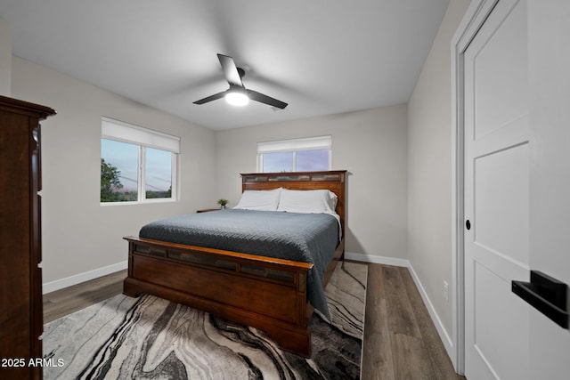 1500 W Pinetree Ct, Show Low, AZ 85901 - bedroom featuring multiple windows, wood finished floors, and a ceiling fan