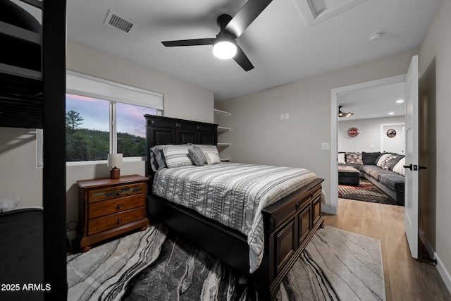 1500 W Pinetree Ct, Show Low, AZ 85901 - bedroom featuring light wood-style floors and ceiling fan