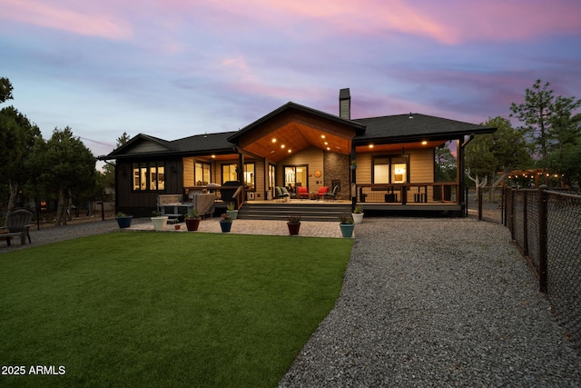1500 W Pinetree Ct, Show Low, AZ 85901 - back of property with a chimney and a patio