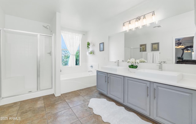 1821 E Patrick Ln, Phoenix, AZ 85024 - full bath with a stall shower, double vanity, a garden tub, and tile patterned floors