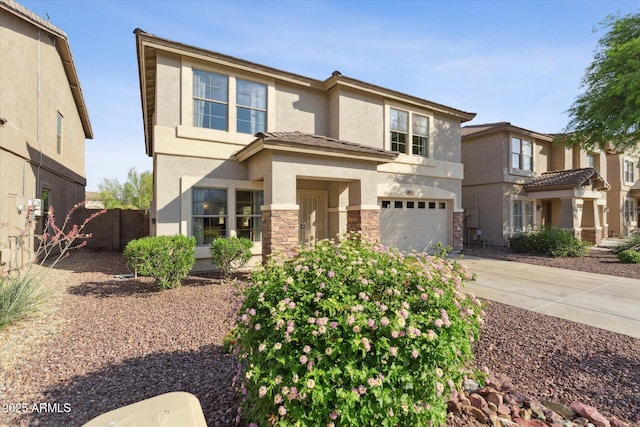 1821 E Patrick Ln, Phoenix, AZ 85024 - view of front facade featuring an attached garage, stucco siding, stone siding, driveway, and a tiled roof