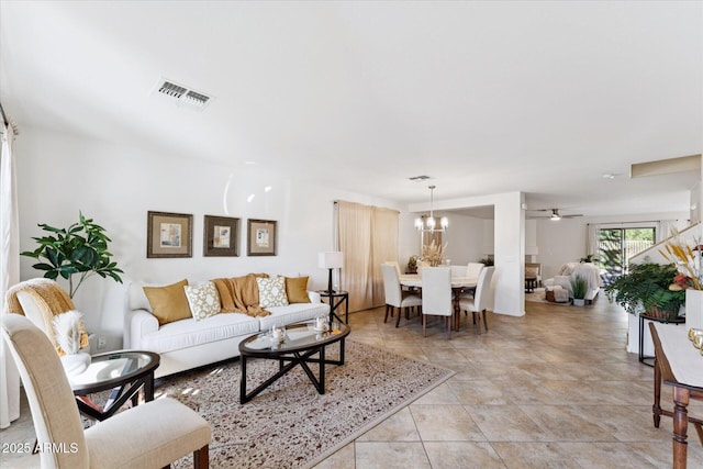 1821 E Patrick Ln, Phoenix, AZ 85024 - living room with a chandelier and a ceiling fan