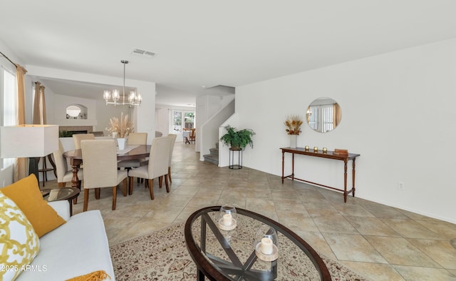 1821 E Patrick Ln, Phoenix, AZ 85024 - dining area with stairway, a chandelier, and light tile patterned floors