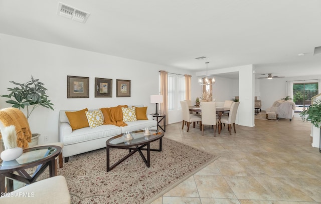 1821 E Patrick Ln, Phoenix, AZ 85024 - living room featuring a chandelier and ceiling fan