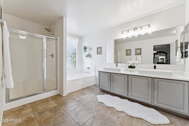 1821 E Patrick Ln, Phoenix, AZ 85024 - full bathroom featuring a stall shower, double vanity, a garden tub, and tile patterned floors
