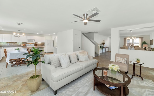 1821 E Patrick Ln, Phoenix, AZ 85024 - living area with a chandelier, stairway, recessed lighting, ceiling fan, and light tile patterned floors