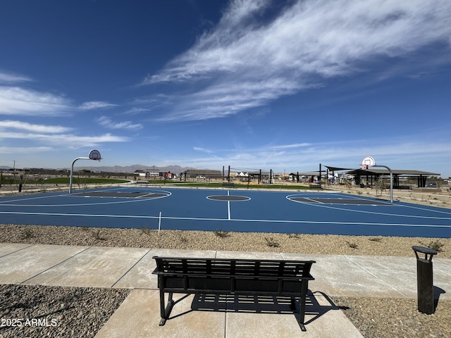 view of home's community with community basketball court