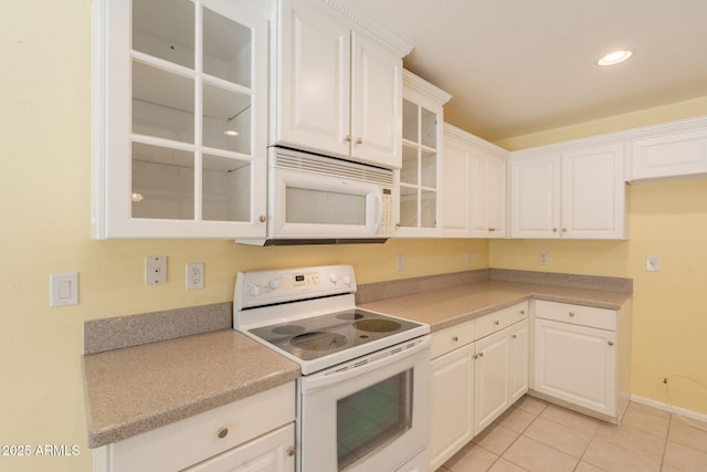 3665 E Thames Way, San Tan Valley, AZ 85140 - kitchen featuring white appliances, light tile patterned floors, glass insert cabinets, white cabinetry, and recessed lighting