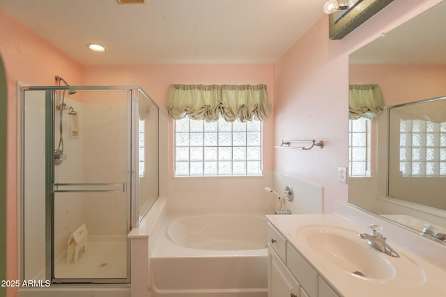 3665 E Thames Way, San Tan Valley, AZ 85140 - bathroom featuring a stall shower, a bath, vanity, and recessed lighting