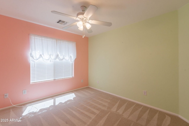 3665 E Thames Way, San Tan Valley, AZ 85140 - spare room featuring light colored carpet, ceiling fan, and baseboards