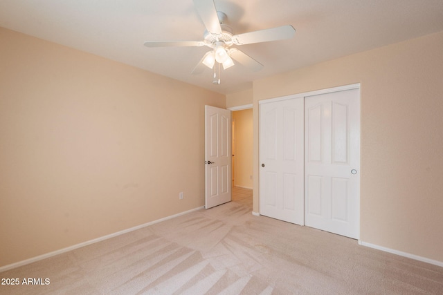 3665 E Thames Way, San Tan Valley, AZ 85140 - unfurnished bedroom featuring light colored carpet, a closet, baseboards, and ceiling fan