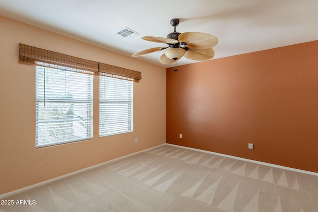 3665 E Thames Way, San Tan Valley, AZ 85140 - empty room featuring light carpet, a ceiling fan, and baseboards