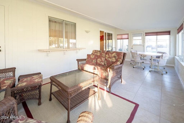 living room with tile patterned flooring